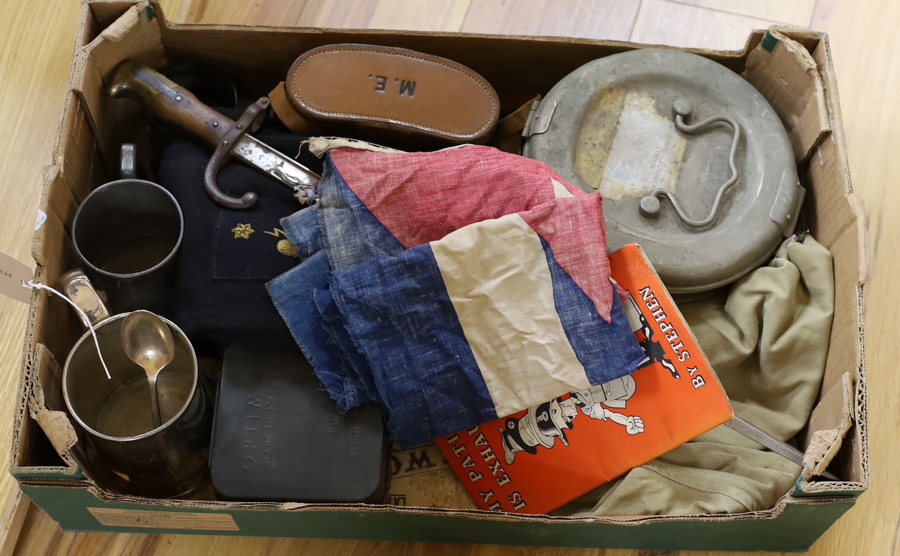 A box of militaria items